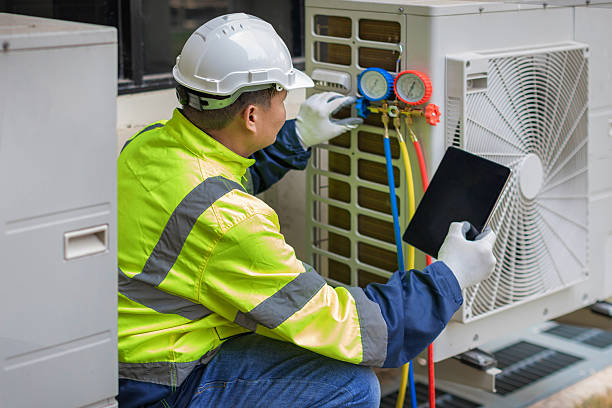 Professional Emergency Hvac Repair technician working in Rockville Centre, NY